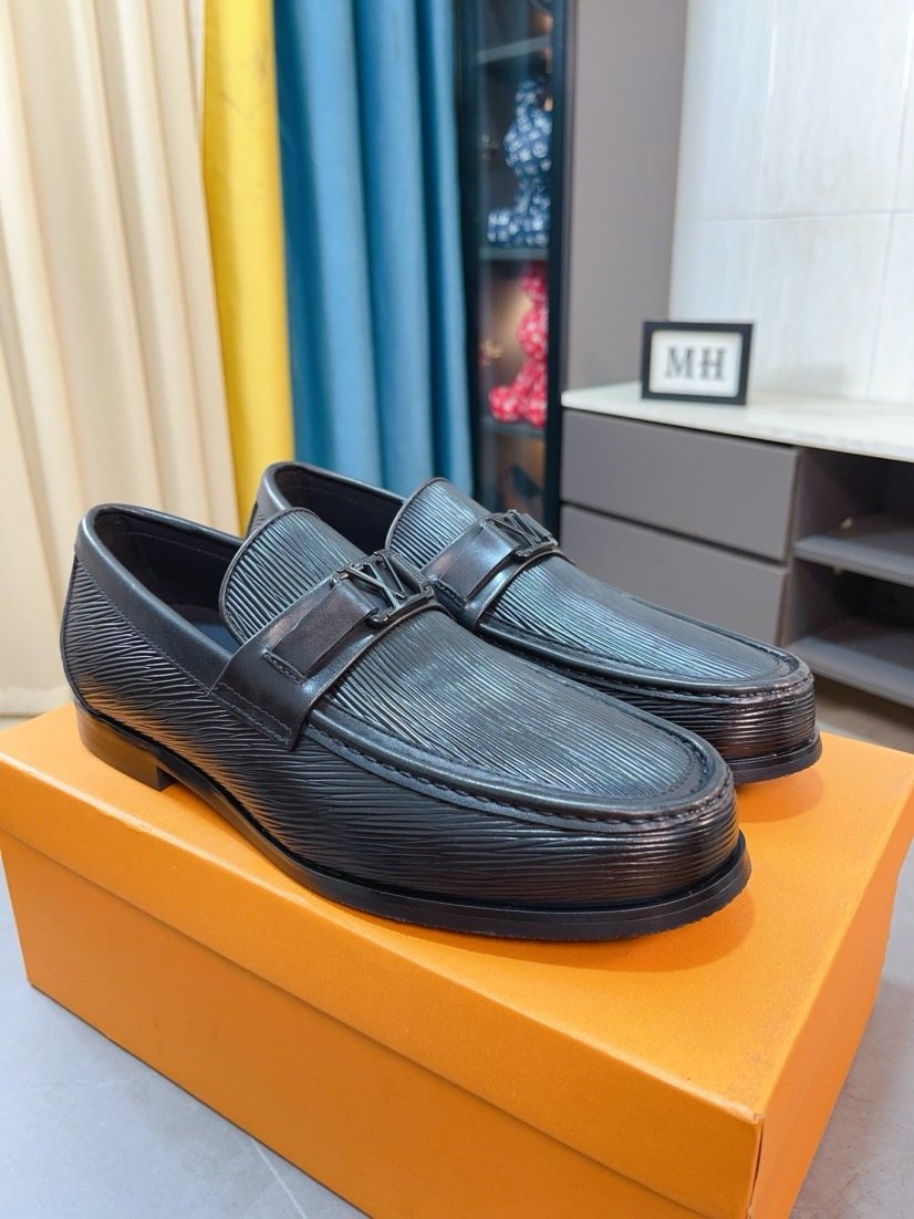 Louis Vuitton Black Textured Bar Slip-On Shoes — front