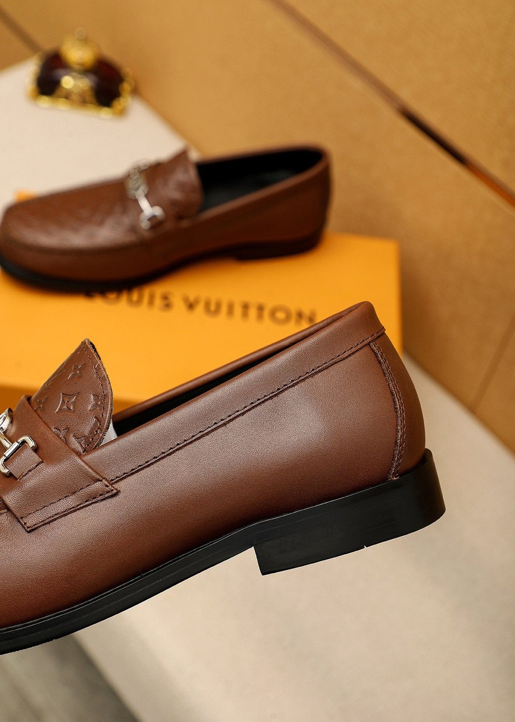 Louis Vuitton Embossed Buckle Loafers — back